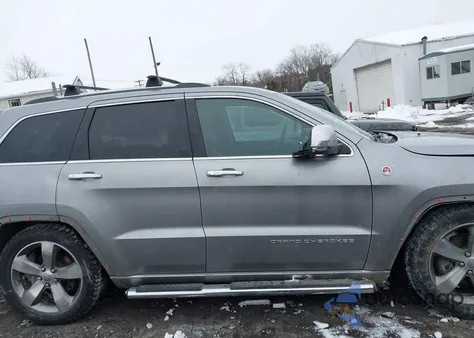 2014 Jeep Grand Cherokee Overland z USA, uszkodzony, nr VIN 1C4RJFCGXEC219926